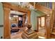 Living room with hardwood floors, fireplace, and wood detailing at 1563 High St, Denver, CO 80218