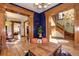 Open living area with hardwood floors and access to other rooms at 1563 High St, Denver, CO 80218