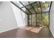 Bright atrium with expansive windows and views of the lush backyard at 2366 S Troy St, Aurora, CO 80014