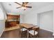 View of the dining room and kitchen area with an open floor plan and ceiling fan at 2366 S Troy St, Aurora, CO 80014
