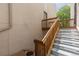 Exterior shot of the building entrance with wooden stairs leading up to the front door at 2366 S Troy St, Aurora, CO 80014