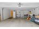 Spacious garage with storage shelves and ample room for parking at 2366 S Troy St, Aurora, CO 80014