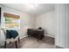 Bright home office with a modern desk, comfortable chair, and natural light at 1892 S Meade St, Denver, CO 80219