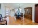 Dining room features a wood table and chairs with a china hutch at 10023 Uravan St, Commerce City, CO 80022