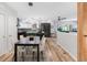 Open floor plan shows dining area adjacent to kitchen and living spaces at 3295 Blake St # 102, Denver, CO 80205