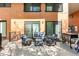 Outdoor patio with comfortable seating, perfect for relaxing and entertaining at 3295 Blake St # 102, Denver, CO 80205