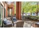 Charming outdoor patio with a grill and seating area for enjoying the outdoors at 3295 Blake St # 102, Denver, CO 80205