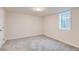 Well-lit bedroom features two windows and carpeted floors at 9295 E 12Th Ave, Aurora, CO 80010