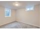 Bedroom with carpeting and a bright window at 9295 E 12Th Ave, Aurora, CO 80010