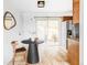 Cozy dining area in the kitchen with a table for two and convenient access to the backyard at 822 S Worchester St, Aurora, CO 80012