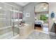 This bathroom features a glass shower and separate jacuzzi tub at 14879 Xenia St, Thornton, CO 80602