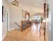 Open living space featuring high ceilings, hardwood floors, and ample natural light at 14879 Xenia St, Thornton, CO 80602