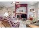 Inviting living room showcases a fireplace, comfortable sofas, and an open layout for entertaining at 14879 Xenia St, Thornton, CO 80602
