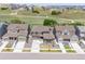 Beautiful aerial view of homes with lush landscaping and manicured lawns in a desirable neighborhood at 17121 Desert Wine Ln, Parker, CO 80134