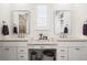 Bright bathroom with dual sinks, stylish fixtures, and a neutral color palette at 17121 Desert Wine Ln, Parker, CO 80134