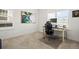 Bright home office space with a large window and a comfortable chair at 17121 Desert Wine Ln, Parker, CO 80134