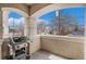 Covered balcony area with a built-in grill, perfect for outdoor cooking and entertaining at 375 Josephine St # D, Denver, CO 80206