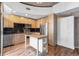 Modern kitchen with stainless steel appliances and island at 1700 Bassett St # 502, Denver, CO 80202