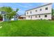 Expansive backyard with lush green lawn, shed, and potential for outdoor entertaining or play at 13483 Alcott Way, Broomfield, CO 80020