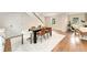 Dining room features a modern table set, and hardwood floors at 13483 Alcott Way, Broomfield, CO 80020