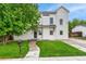 Charming two-story home with a well-maintained lawn and a welcoming walkway to the front door at 13483 Alcott Way, Broomfield, CO 80020