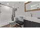 Stylish bathroom with subway tile shower and modern vanity at 5557 Aspen Ave, Erie, CO 80516