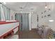 Fun bedroom with colorful decor and play area at 5557 Aspen Ave, Erie, CO 80516