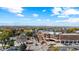 Bustling downtown with tree-lined streets, distinct architecture, and a mountain view on a clear day at 10779 Longs Way, Parker, CO 80138