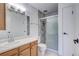 Updated bathroom with shower, vanity, and tile at 3082 S Wheeling Way # 408, Aurora, CO 80014