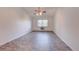 Bright bedroom with window, ceiling fan and tile floors at 3082 S Wheeling Way # 408, Aurora, CO 80014