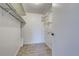 Large walk-in closet with shelving and rods at 3082 S Wheeling Way # 408, Aurora, CO 80014