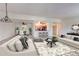 Spacious living room with open floor plan and neutral decor at 3082 S Wheeling Way # 408, Aurora, CO 80014
