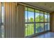 Sunroom with view of the trees and grass at 3082 S Wheeling Way # 408, Aurora, CO 80014