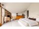 Spacious bedroom with vaulted ceilings, a fireplace and minimalist decor at 3445 S Clermont St, Denver, CO 80222