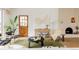 Stylish living room showcasing a fireplace, natural accents, and chic decor creating a warm and inviting atmosphere for relaxation at 3445 S Clermont St, Denver, CO 80222