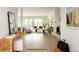 Bright living room featuring stylish furnishings, large windows, and an open floor plan, ideal for modern living and entertaining at 3445 S Clermont St, Denver, CO 80222