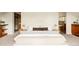 Bright main bedroom with neutral tones, king-sized bed, and recessed lighting at 3445 S Clermont St, Denver, CO 80222