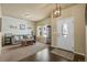 Inviting living room with hardwood floors, neutral paint, and a cozy couch at 19814 Lindenmere Dr, Monument, CO 80132