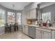 Cozy kitchen with stainless steel dishwasher and eating nook at 6476 Silver Mesa Dr # A, Highlands Ranch, CO 80130