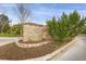 Stone sign reading 'Silver Mesa', surrounded by landscaping, at the community entrance at 6476 Silver Mesa Dr # A, Highlands Ranch, CO 80130