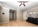 Inviting living room with a ceiling fan and neutral color palette at 14991 E Elk Pl, Denver, CO 80239