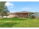 A picturesque single Gathering home featuring a lovely yard, an open deck, and an attached garage at 35100 E 120Th Ave, Hudson, CO 80642