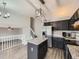 Modern kitchen features a central island, stainless steel appliances, and stylish cabinets at 378 Benton St, Castle Rock, CO 80104