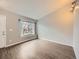 Bright living room with hardwood floors, neutral walls, and large window providing natural light at 378 Benton St, Castle Rock, CO 80104