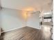 Bright living room with hardwood floors, neutral walls, and an open layout flowing into the kitchen at 378 Benton St, Castle Rock, CO 80104
