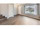 Spacious living room featuring neutral walls, hardwood floors, and staircase at 378 Benton St, Castle Rock, CO 80104