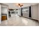 Spacious living room boasts wood floors, neutral walls, and plentiful natural light at 378 Benton St, Castle Rock, CO 80104