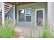 Exterior entrance with well-maintained landscaping, modern architectural details and clearly marked unit number at 2809 Syracuse Ct # 129, Denver, CO 80238