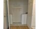 Convenient laundry room featuring a washer, dryer, storage shelves, and tile flooring at 2809 Syracuse Ct # 129, Denver, CO 80238