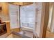 View of the refrigerator in the kitchen with an open door, and interior storage at 2809 Syracuse Ct # 129, Denver, CO 80238